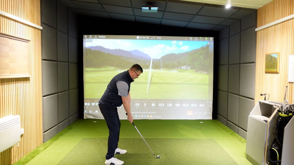 TrackMan data on screen during a golf lesson in Shrewsbury